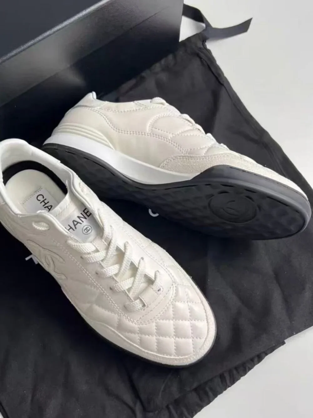 Chanel White Quilted CC Logo Leather & Suede Low‑Top Sneakers